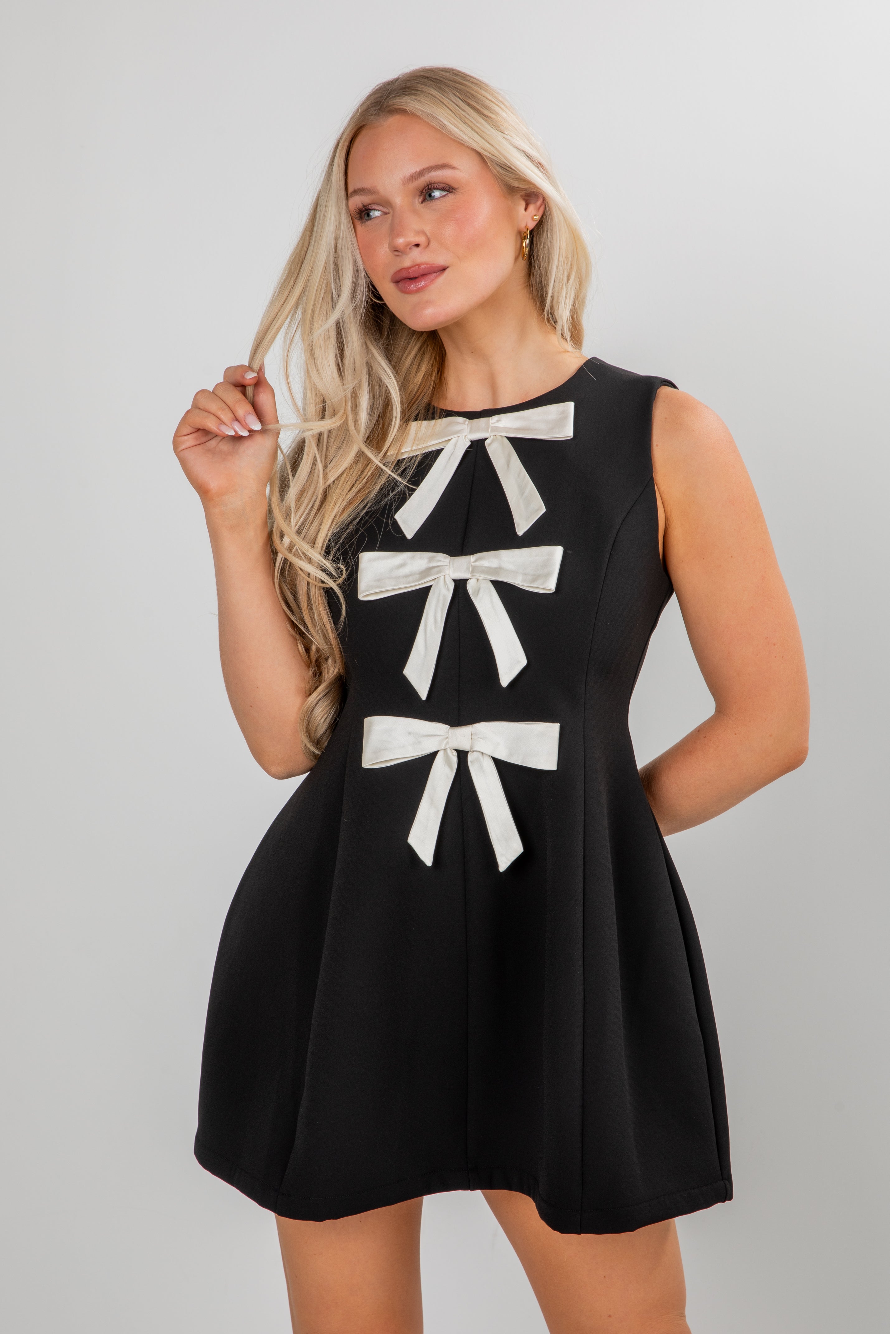 Enchanting Presence Black Bow Mini Dress
